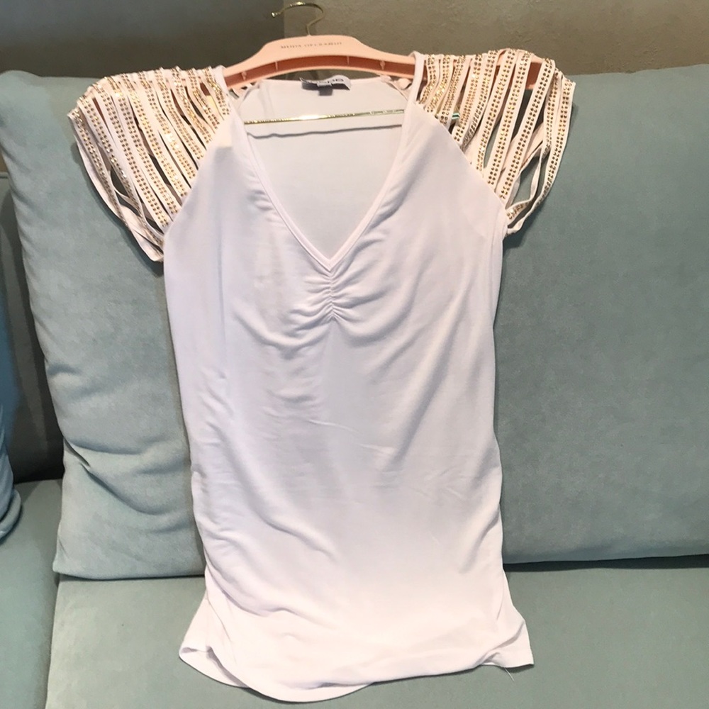 Bebe white top with gold crystal sleeves